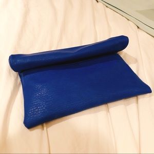 Street level blue folding clutch